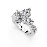 Anillo de compromiso con diamantes cultivados en laboratorio de talla marquesa con pavé retorcido