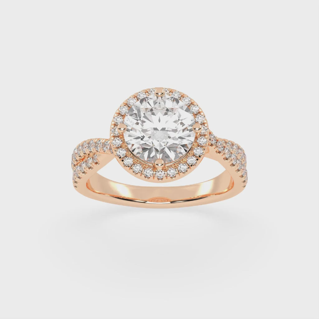 Anillo de compromiso con diamantes cultivados en laboratorio de talla redonda y halo con engaste pavé retorcido